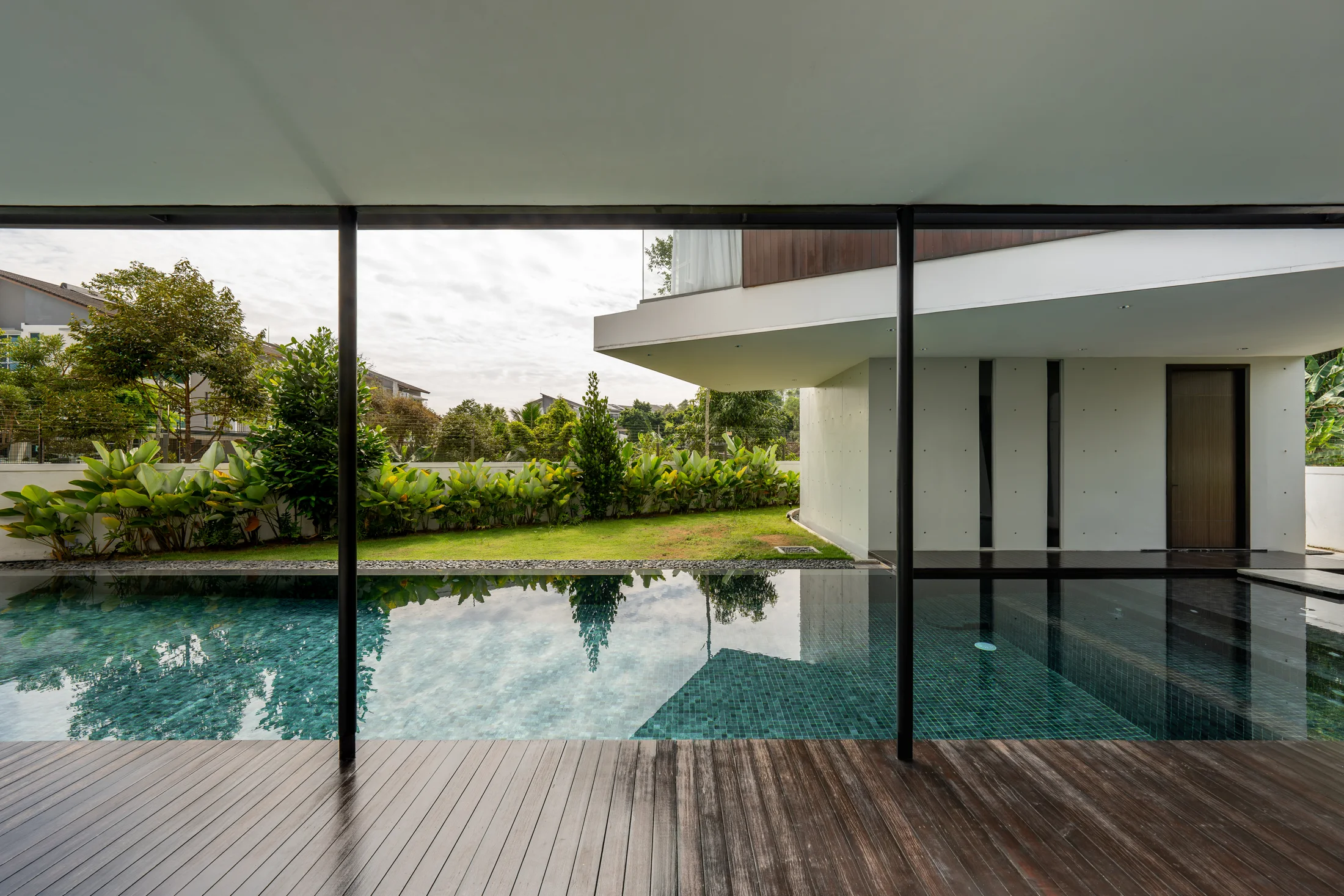 Pool beneath a sheltered walkway
