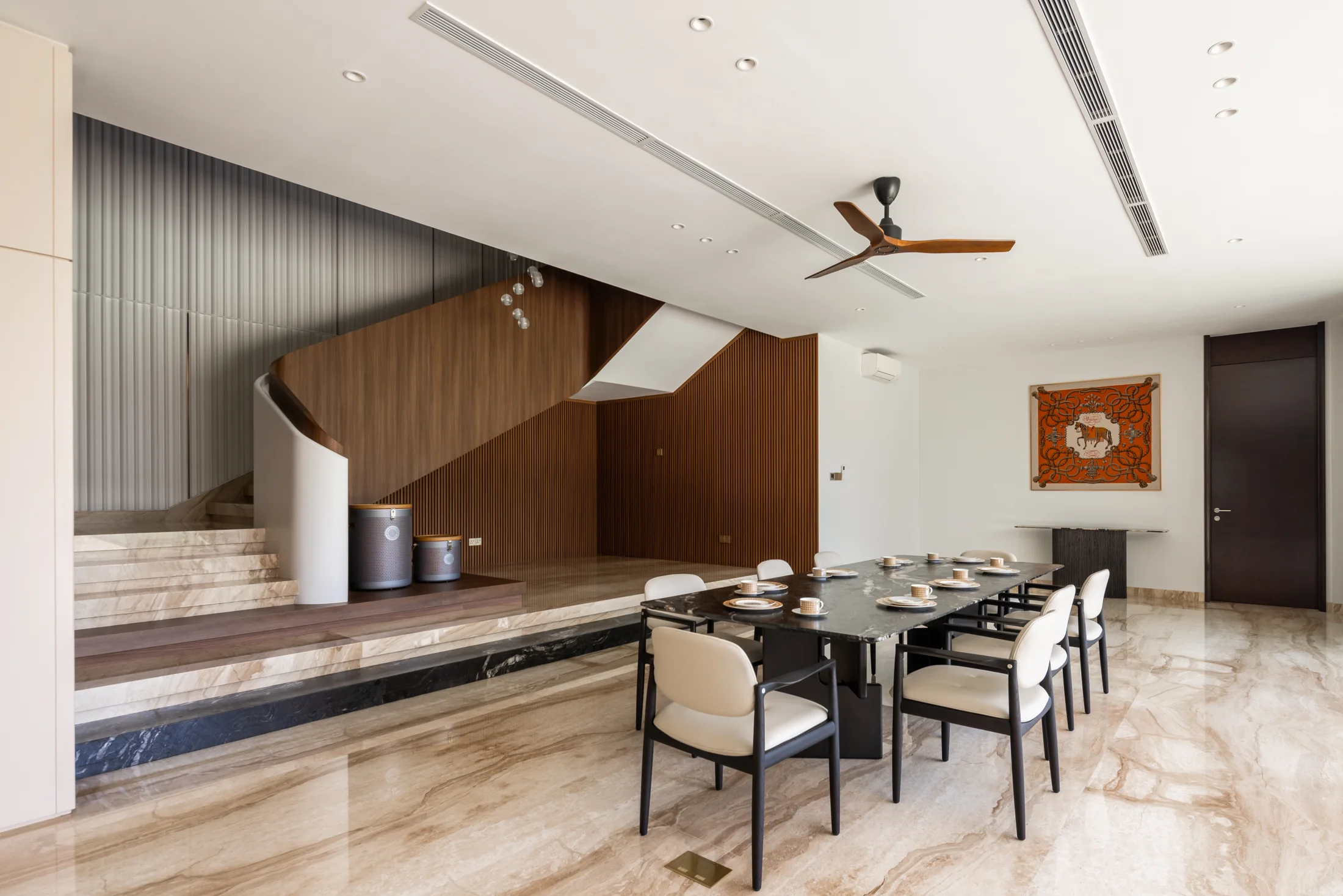 Dining space and sculptural stair