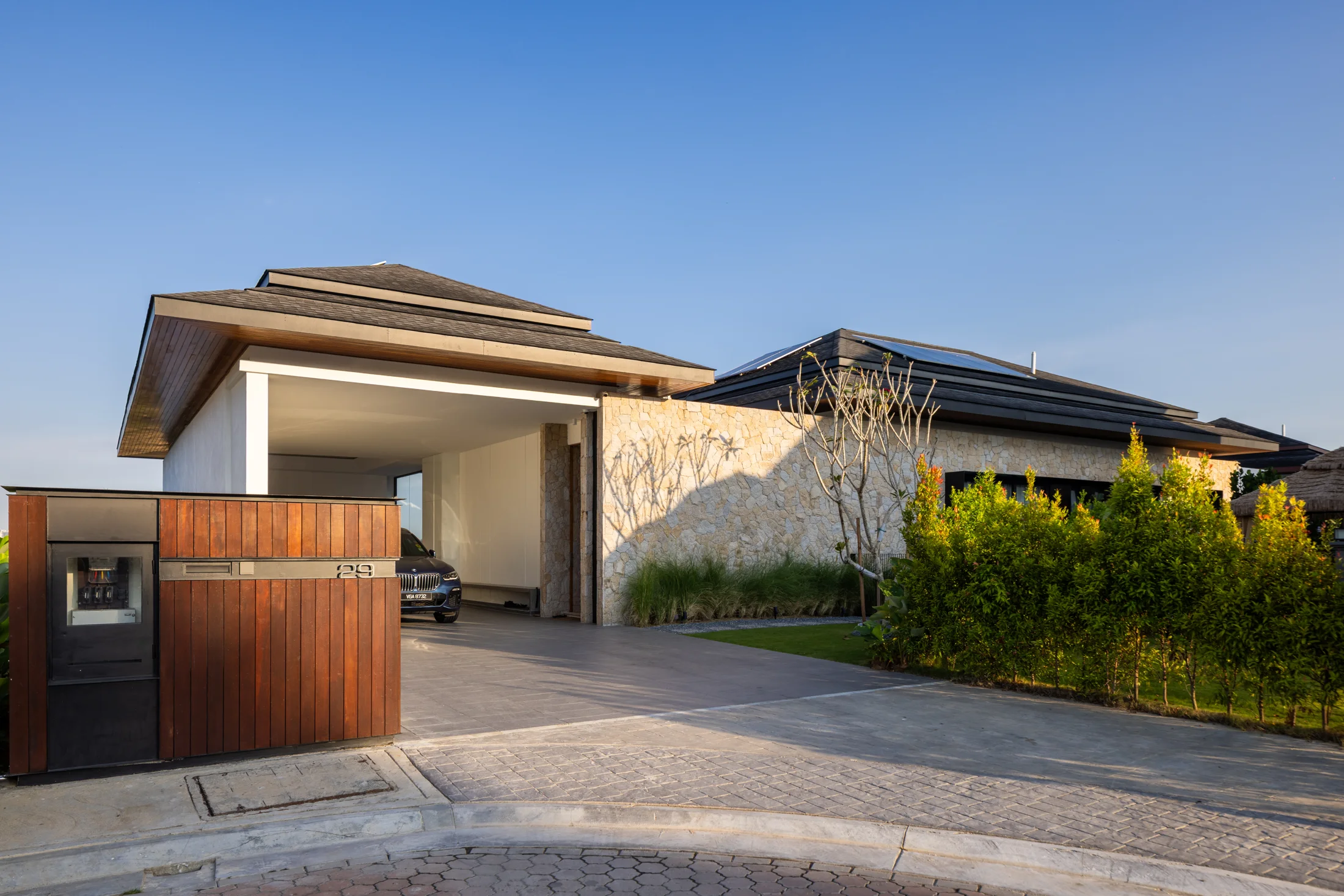 Stone walls and entrance canopy