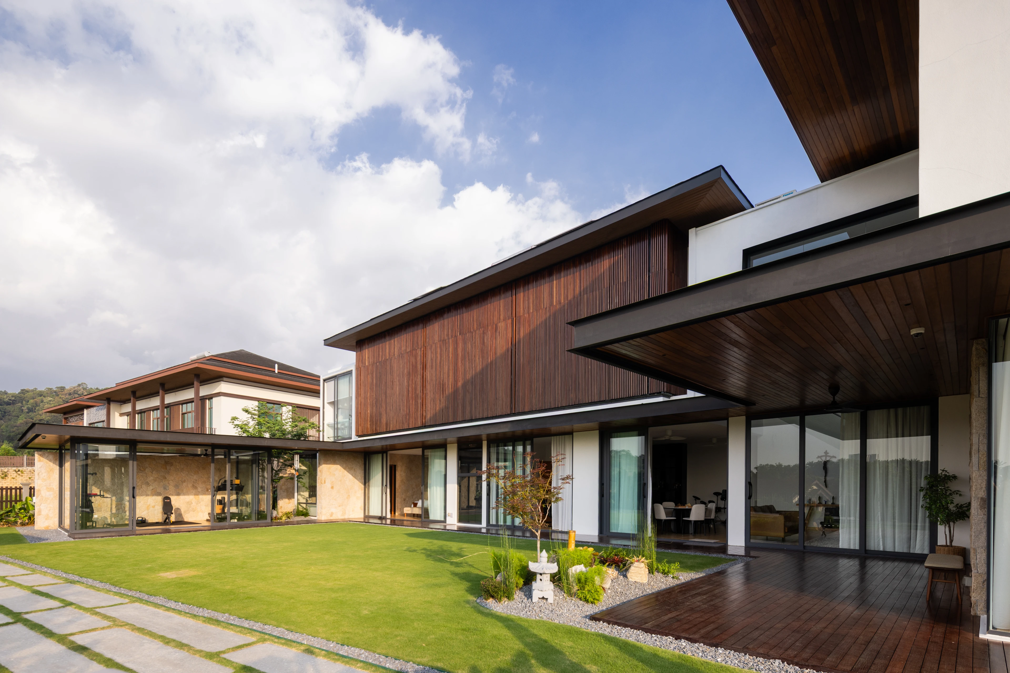 Garden lawn and timber-screened elevation
